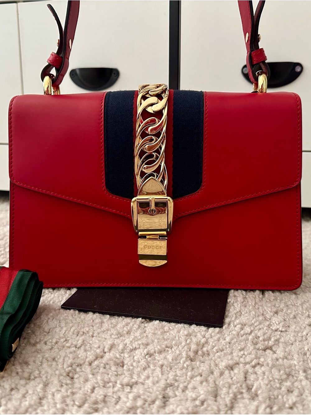 Red Gucci Sylvie Leather Shoulder Bag with Gold Chain Accent